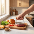 Hamburger Meat Press shaping a beef patty
