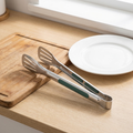 Non-Slip Stainless Steel Food Tongs shown at true size on a kitchen counter